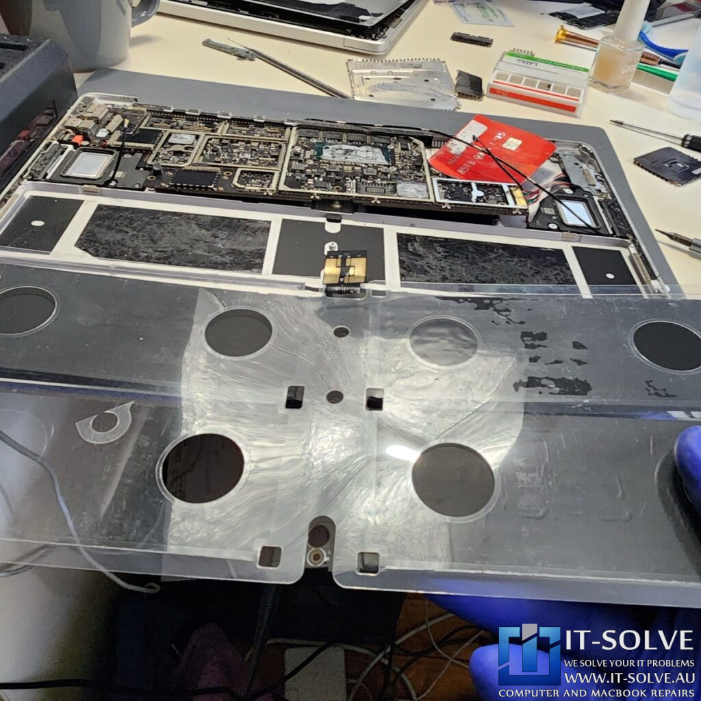 Photo of the genuine battery with matching model and part numbers